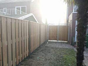 Schutting en poort in Herten